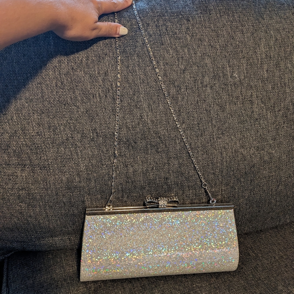 Sequin Sparkly Clutch Bag with Silver Chain Strap and Rhinestone Bow Closure